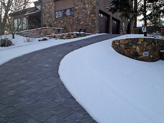 A radiant heated driveway after a snowstorm.